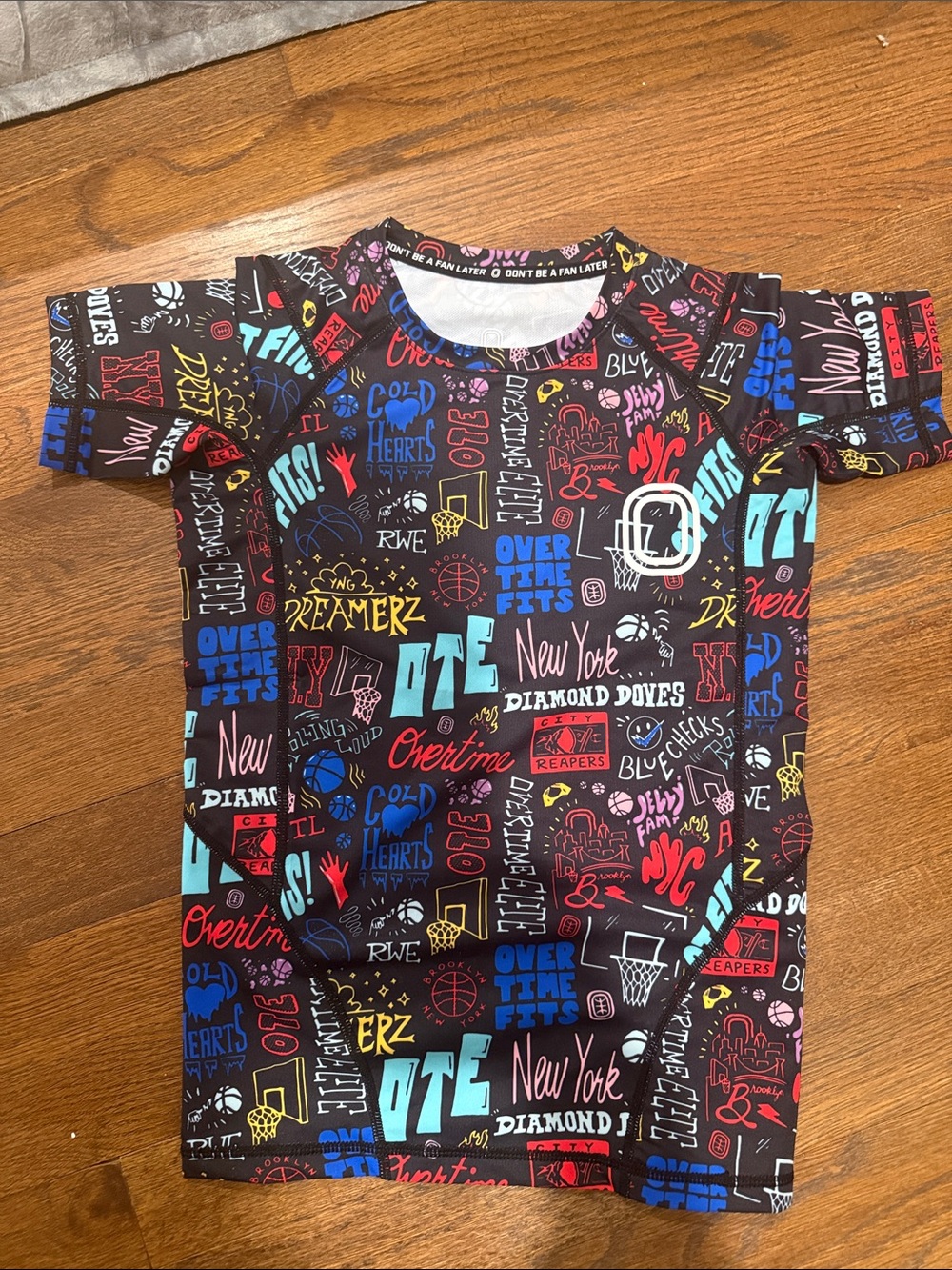 Black Graphic overtime Kids compression Tee with Colorful Lettering
